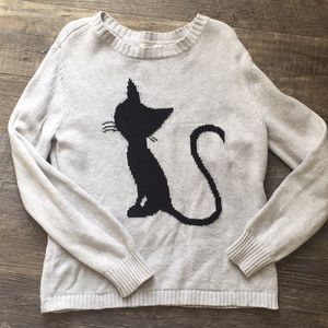 Cat sweater size 10/12 looks to fit a 12 just fine